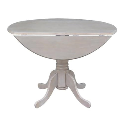 IC International Concepts, 42" Round Dual Drop Leaf Pedestal Dining Table, Solid Real Wood, Sturdy Parawood, Dimensions 42"D x 42"W x 29.5"H, 20mm thickness, 40lbs Weight Capacity, Washed Gray Taupe - color: Washed Gray Taupe
