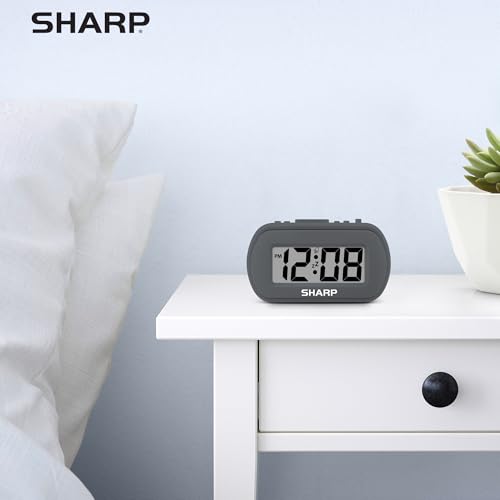 Sharp Battery Alarm Clock, Soft-Touch Case and Backlight, Charcoal Black | Soft-touch rubberized case; Battery operated; Blue backlight on demand; Ascending alarm; Snooze; Easy to use - color: Charcoal Black