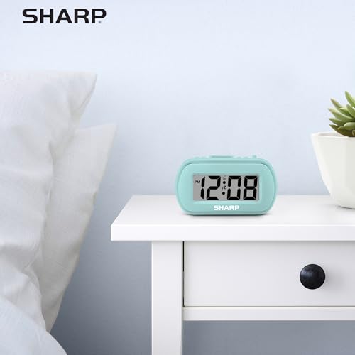 Sharp Battery Alarm Clock with Soft-Touch Case and Blue Backlight, Mint | Soft-touch rubberized case; Battery operated; Blue backlight on demand; Ascending alarm; Snooze; Easy to use - color: Mint