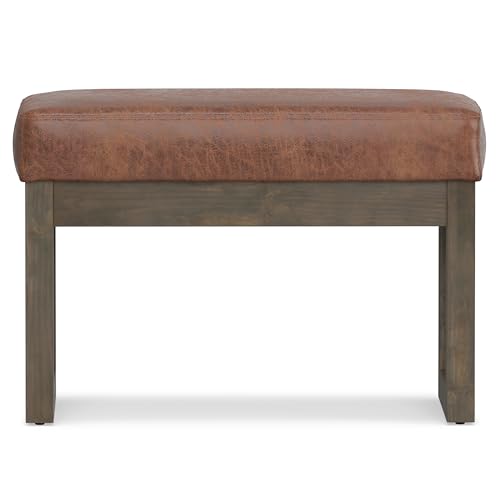 SIMPLIHOME Milltown 27" Wide Vegan Leather Ottoman in Saddle Brown | Distressed saddle brown, contemporary ottoman with a cushioned seat for bedroom seating; rectangle footstool or pouf. - color: Distressed Saddle Brown, style: Small Ottoman Bench