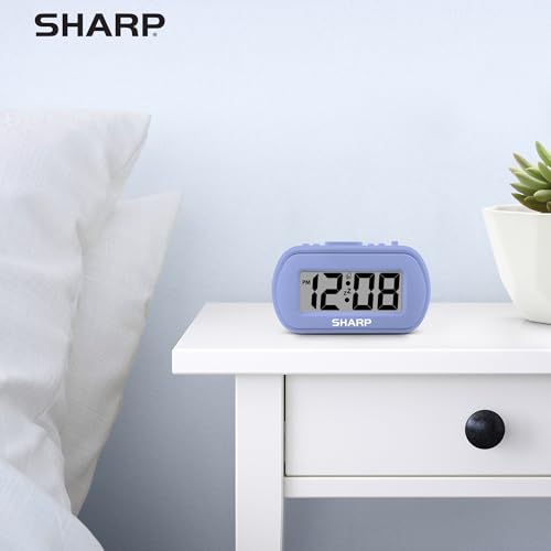 Sharp Battery Alarm Clock with Soft-Touch Case and Blue Backlight, Lavender | Soft-touch rubberized case; Battery operated; Blue backlight on demand; Ascending alarm; Snooze; Easy to use - color: Lavender