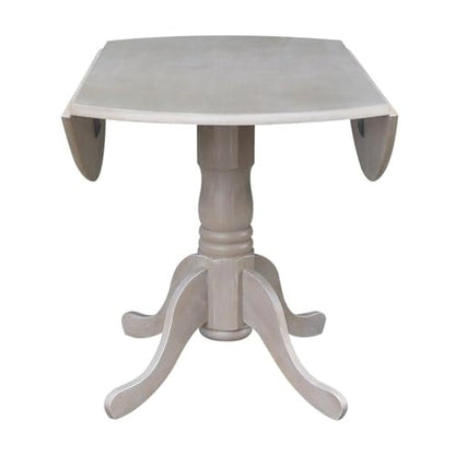 IC International Concepts, 42" Round Dual Drop Leaf Pedestal Dining Table, Solid Real Wood, Sturdy Parawood, Dimensions 42"D x 42"W x 29.5"H, 20mm thickness, 40lbs Weight Capacity, Washed Gray Taupe - color: Washed Gray Taupe