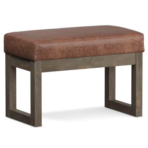 SIMPLIHOME Milltown 27" Wide Vegan Leather Ottoman in Saddle Brown | Distressed saddle brown, contemporary ottoman with a cushioned seat for bedroom seating; rectangle footstool or pouf. - color: Distressed Saddle Brown, style: Small Ottoman Bench