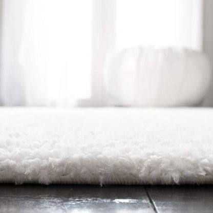 SAFAVIEH August Shag Collection Runner Rug - 2'3" x 6', White, Solid Design, Non-Shedding & Easy Care, 1.2-inch Thick Ideal for High Traffic Areas in Living Room, Bedroom (AUG900A) - color: White, size: 2'3" x 6' (Runner)