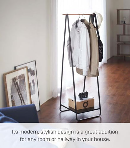 YAMAZAKI Home Tower Freestanding Coat Hanger Clothes Rack With Shelf, 55" - Steel | Freestanding coat hanger features a steel frame and bottom shelf. Space-saving vertical organization. Easy to assemble. - color: Black