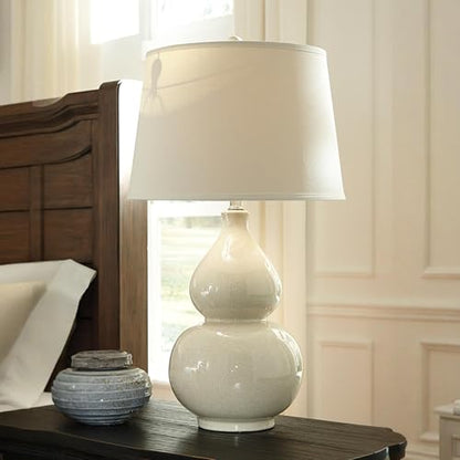 Signature Design by Ashley Saffi 30" Tall Ceramic Table Lamp, Cream | Textured crackle glaze ceramic base, Adjustable 3-way switch for custom ambiance, Light-diffusing fabric drum shade - style: Saffi