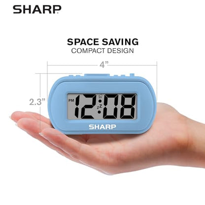 Sharp Battery Alarm Clock with Soft-Touch Case and Backlight, Light Blue | Soft-touch rubberized case; Battery operated; Blue backlight on demand; Ascending alarm; Snooze; Easy to use - color: Blue