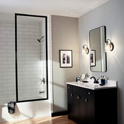 Kichler Braelyn 9.5" Wall Sconce in Olde Bronze®, 1-Light Industrial Wall Mount with Clear Seeded Glass, (9.5" H x 5" W), 45457OZ | Clear seeded glass delivers textured illumination in bathrooms, hallways, bedrooms and living spaces, 45457OZ - color: Old