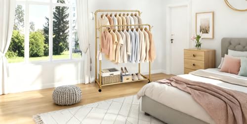 AT-VALY Double Rods Clothes Rack, Sturdy Metal Garment Rack with Wheels, Portable Wardrobe Rack with Bottom Shelf & Side Hooks, Heavy Duty Coat Hanger Stand for Bedroom, Laundry, Living Room,Gold