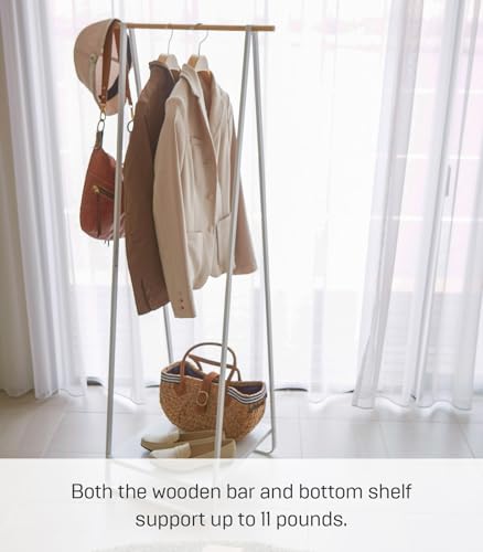 YAMAZAKI Home Freestanding Coat Hanger Clothes Rack with Shelf Steel One Size White | Freestanding coat hanger features a steel frame and bottom shelf. Space-saving vertical organization. Easy to assemble. - color: White