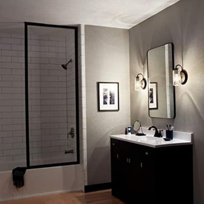 Kichler Braelyn 9.5" Wall Sconce in Olde Bronze®, 1-Light Industrial Wall Mount with Clear Seeded Glass, (9.5" H x 5" W), 45457OZ | Clear seeded glass delivers textured illumination in bathrooms, hallways, bedrooms and living spaces, 45457OZ - color: Old