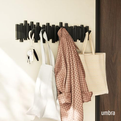 Umbra Sticks Wall Coat Rack, Wall Mount 8 Retractable Hooks, Black | Modern sculptural look, holds five pounds each, fits entryways and bedrooms, easy to install, recycled plastic - color: Black, size: 8-Hook