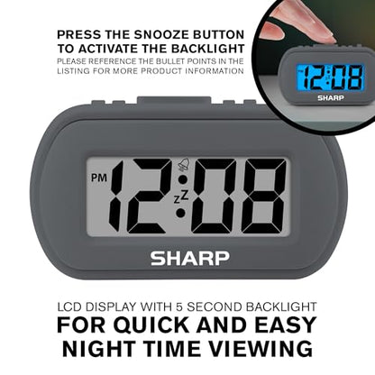 Sharp Battery Alarm Clock, Soft-Touch Case and Backlight, Charcoal Black | Soft-touch rubberized case; Battery operated; Blue backlight on demand; Ascending alarm; Snooze; Easy to use - color: Charcoal Black