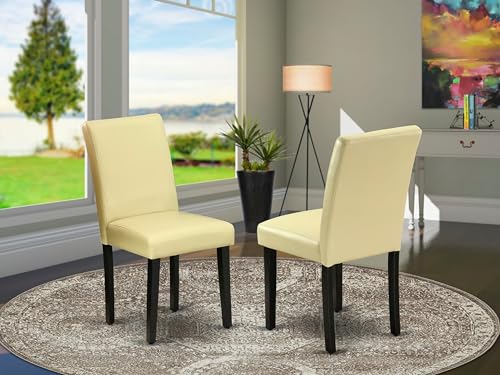 East West Furniture ABP1T73 Abbott Parson Dining Room Chairs - Eggnog Faux Leather Upholstered Chairs, Set of 2, Black - color: Abp1t73