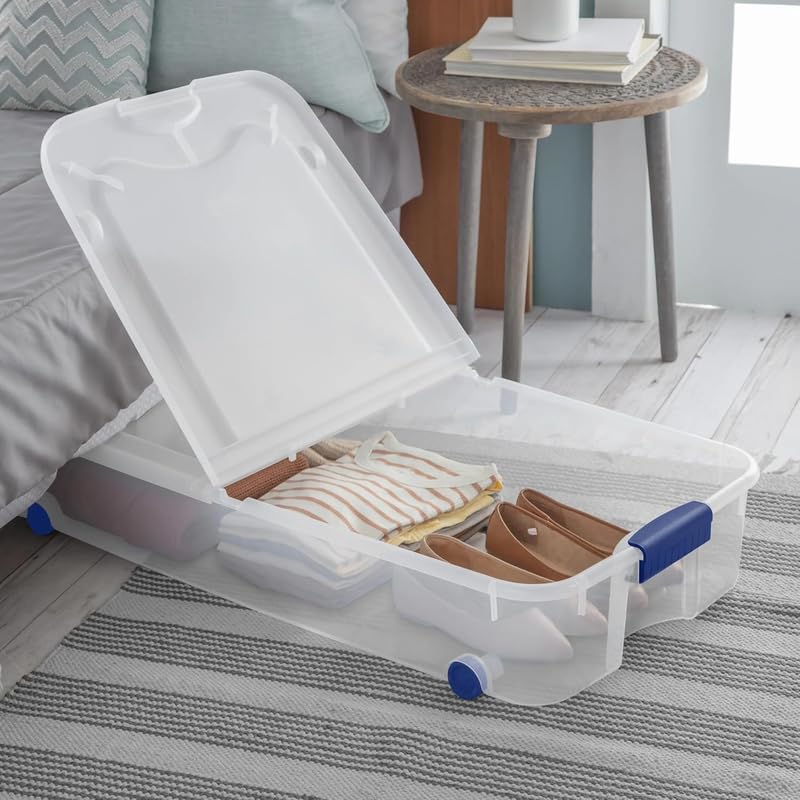 Large storage box, 66 quart transparent under-bed storage box equipped with locking lid and wheels, blue.