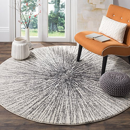 SAFAVIEH Evoke Collection Area Rug - 5'3" Round, Black & Ivory, Abstract Burst Design, Non-Shedding & Easy Care, Ideal for High Traffic Areas in Living Room, Bedroom (EVK228K)